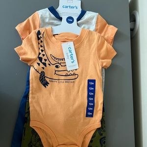 4-piece set for boys from Carter’s Baby. Two onesies and Two pants, Size 12m